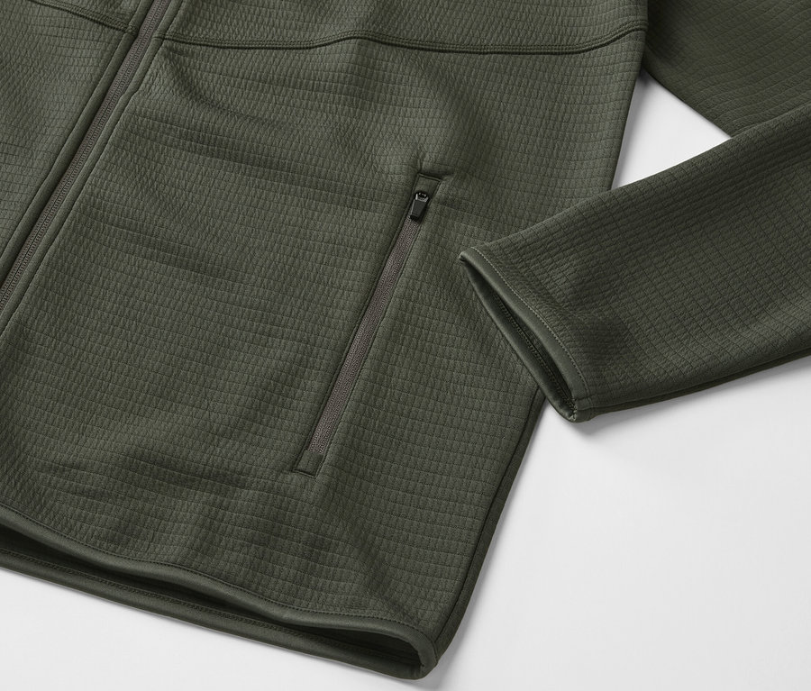 Khaki funkcionális szabadidőfelső, középen cipzárral és cipzáras zsebbel.