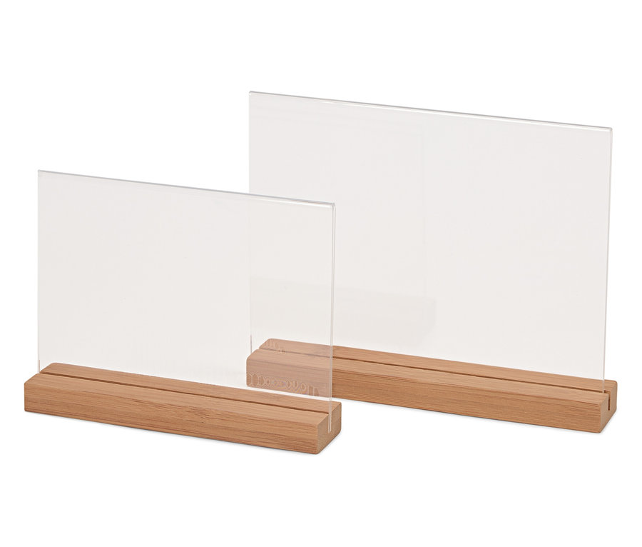 Két átlátszó akril képkeret fa talppal.
