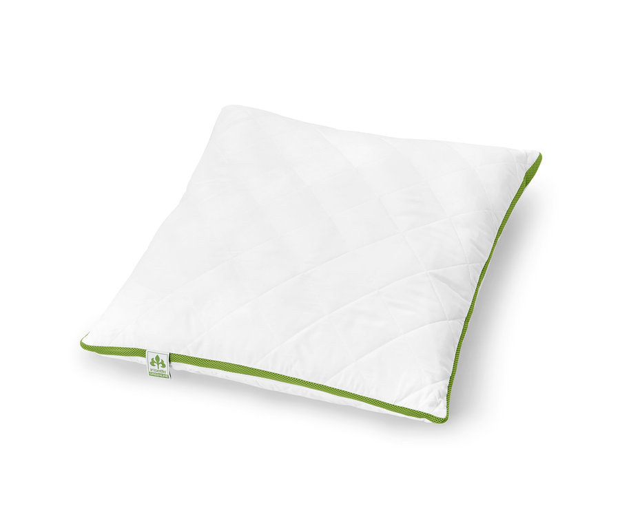 Egy fehér irisette® greenline párna klímaszalaggal fekszik fehér háttéren.