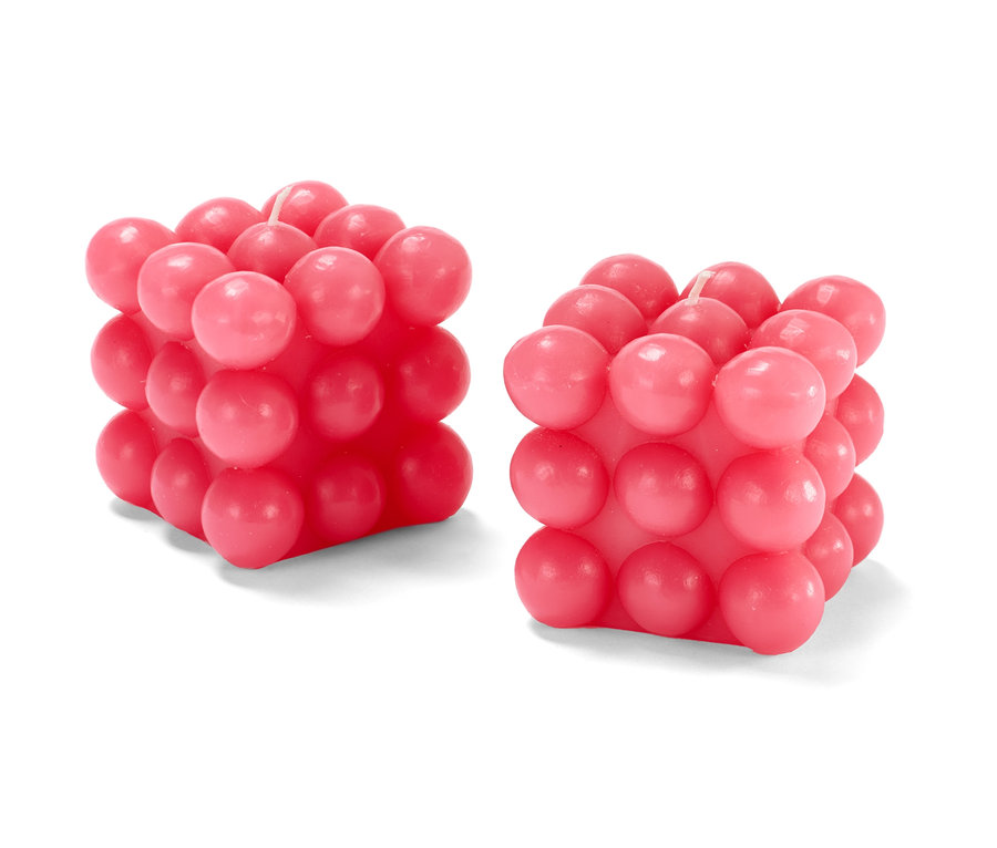 Két rózsaszín bubble gyertya.