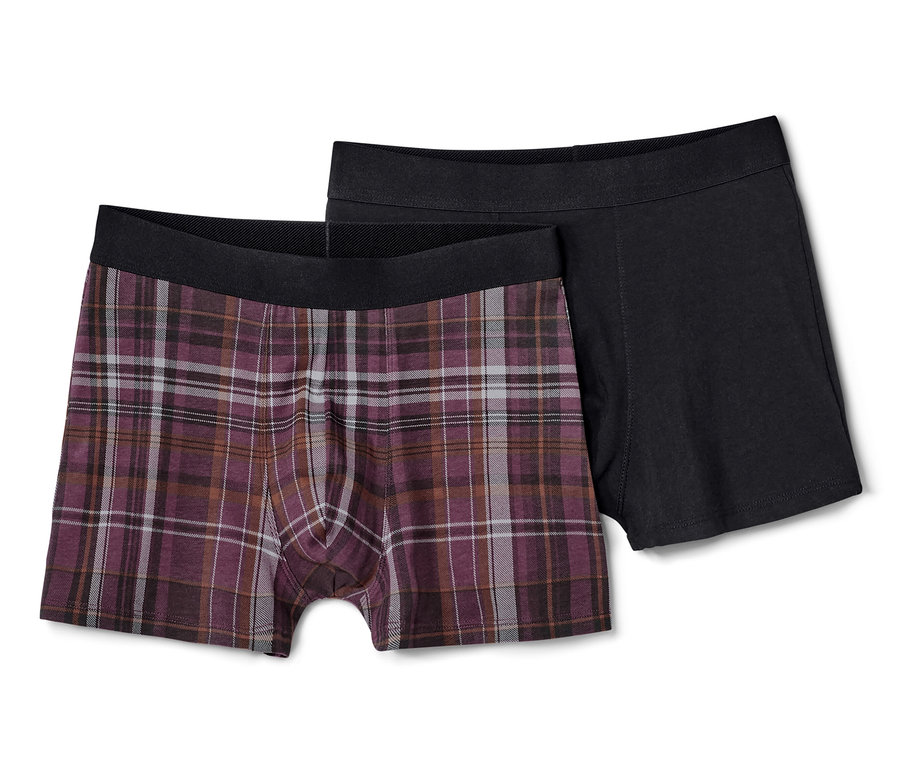 Két férfi boxer alsónadrág, egy kockás és egy fekete.