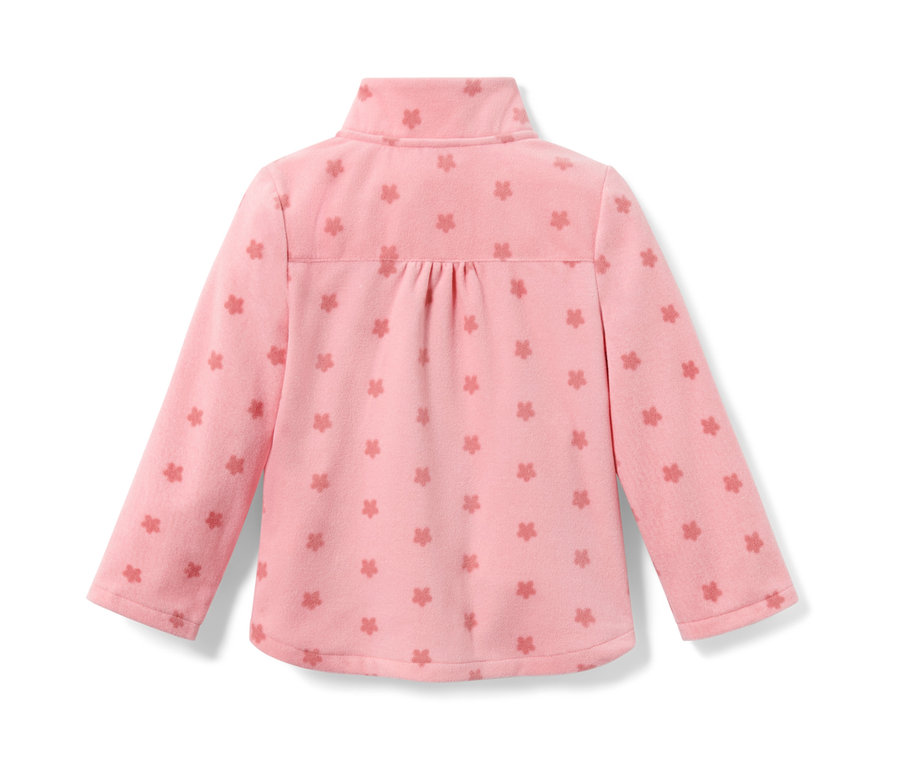 Rózsaszín kisgyerek polárfelső virágmintával.