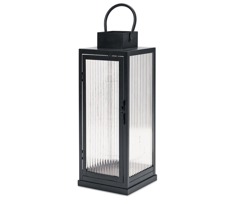 Fekete lámpás függőlegesen bordázott üveglapokkal.