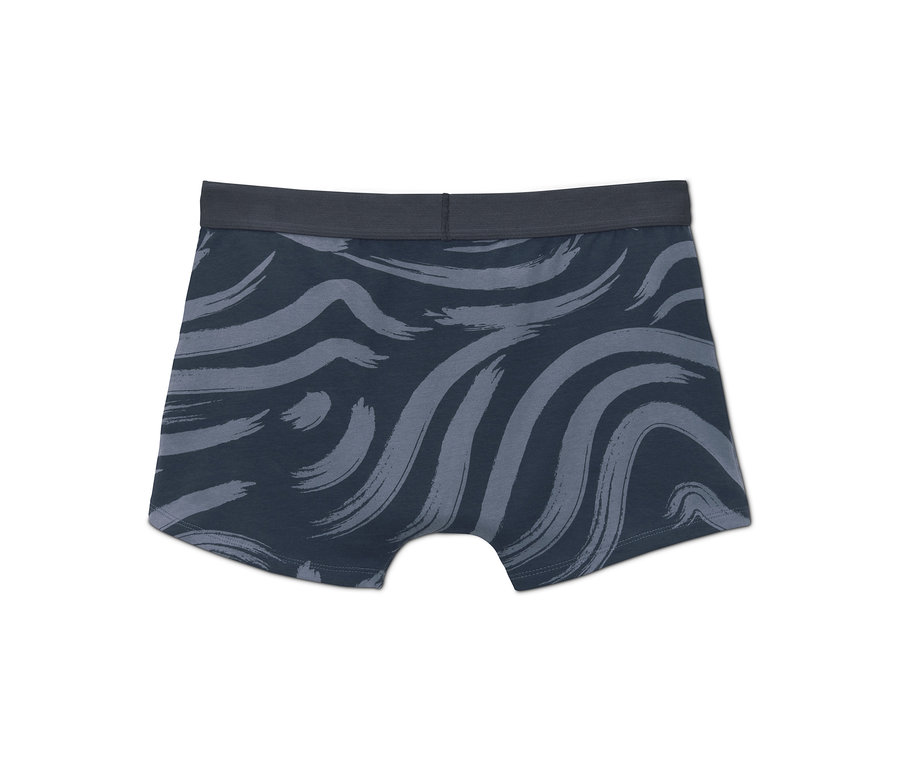 Egy kék, mintás 2 darabos férfi boxer alsónadrág szettből.