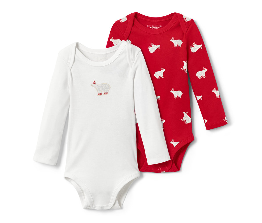 Két kisgyerek hosszú ujjú body: egy fehér jegesmedve mintával, egy piros, jegesmedve mintás.