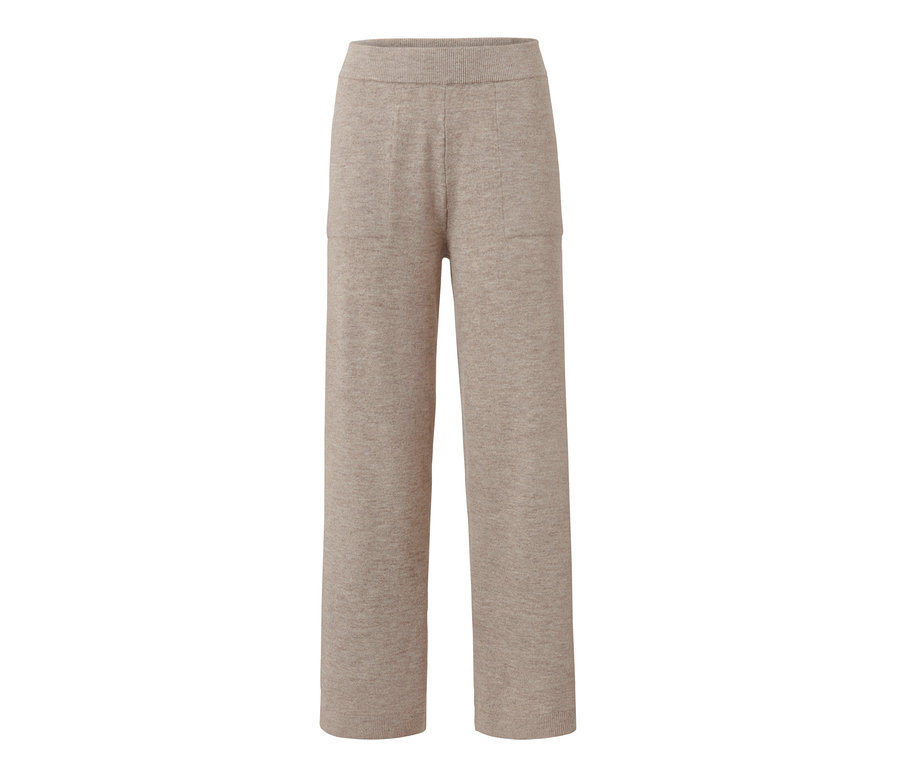 Bézs kötött szabadidőnadrág zsebekkel.