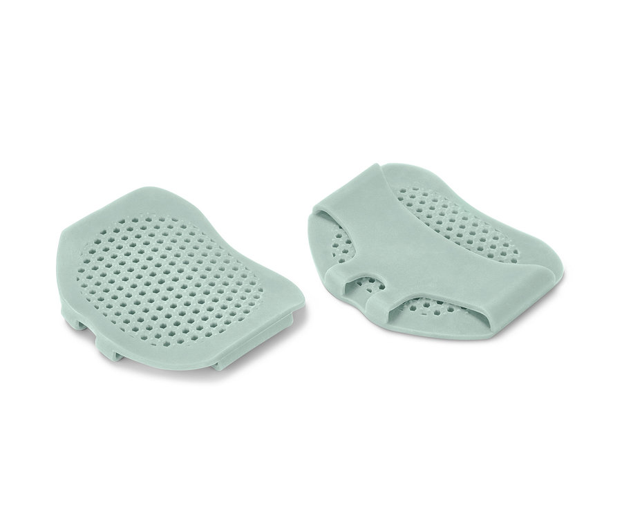 Két világoszöld talppárna-védő.