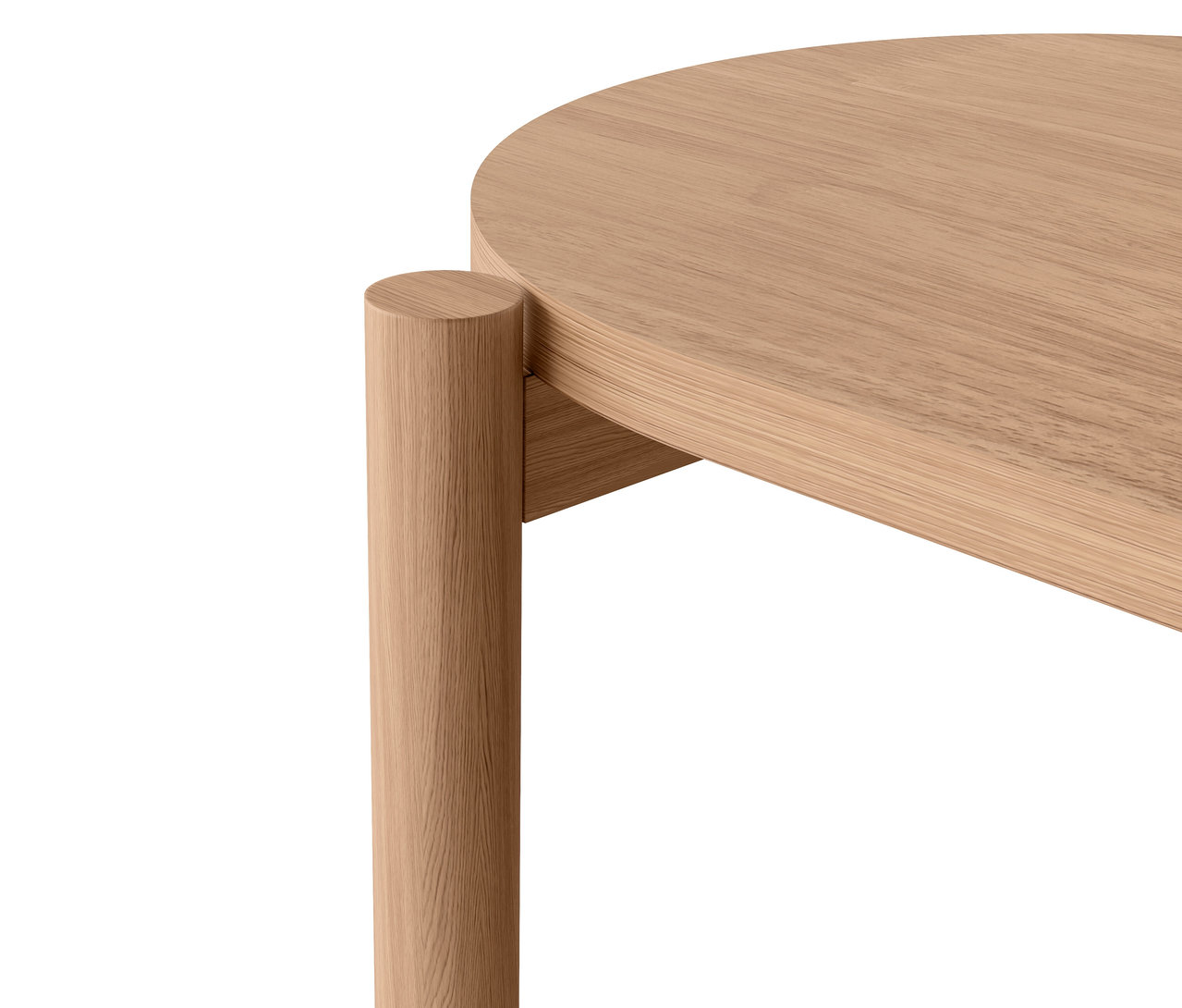 Egy kerek faasztal részlete lábbal.