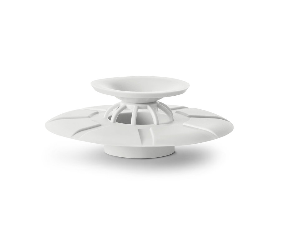 Fehér lefolyószűrő és dugó.