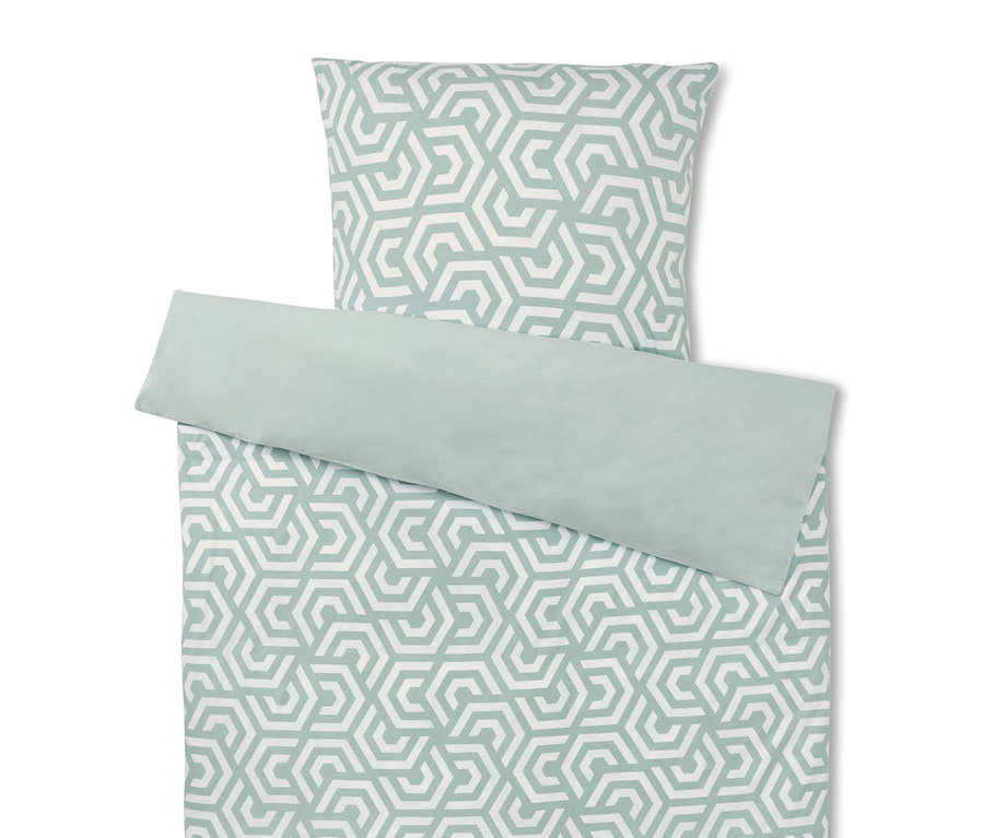 Ágyneműgarnitúra fehér és zöld geometriai mintával.