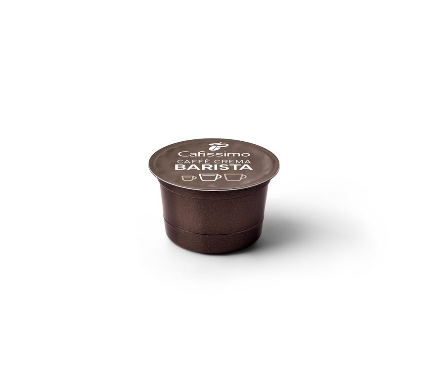 Egyetlen barna Cafissimo Barista Caffè Crema kapszula közelképe.