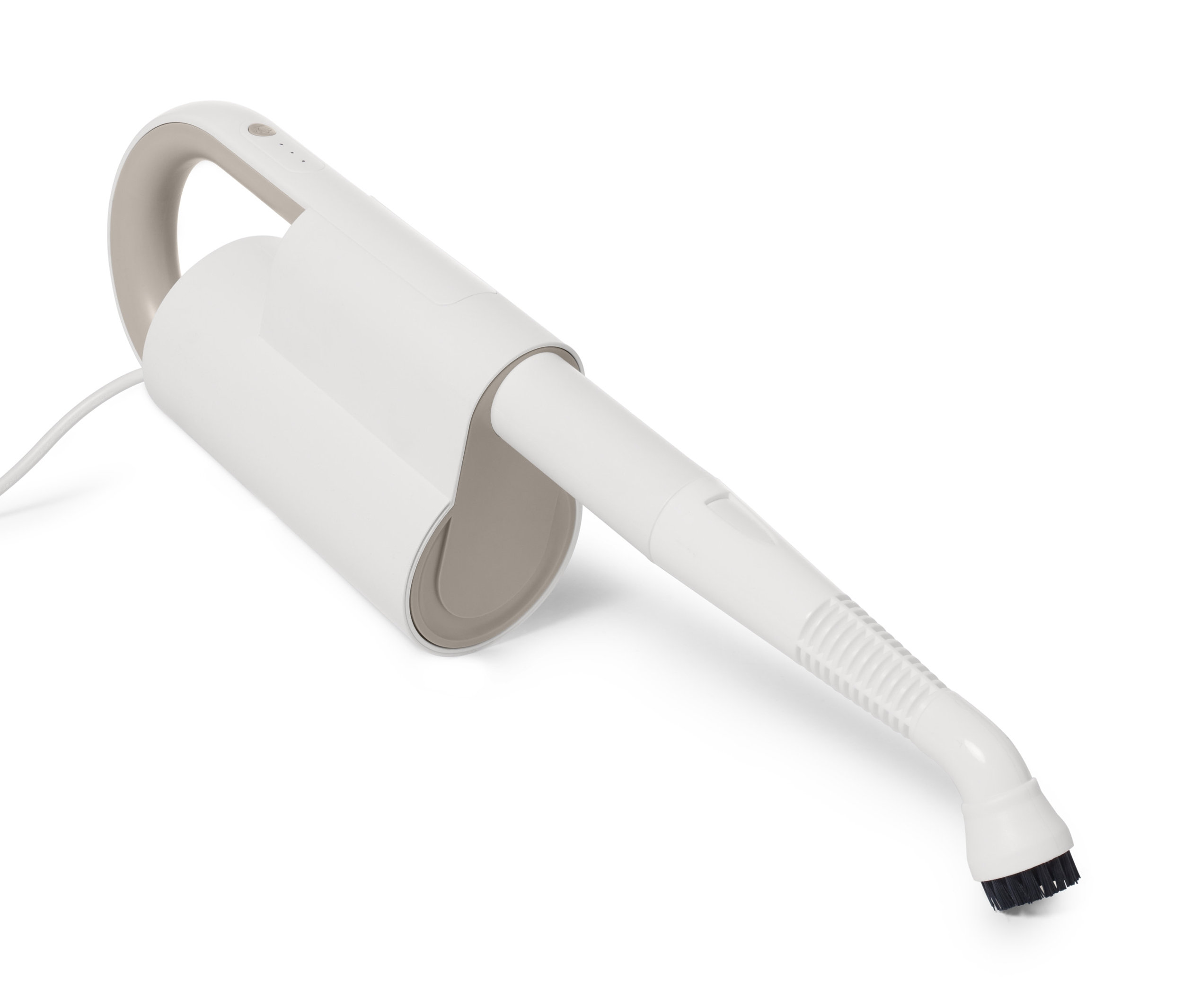 Közelkép egy kompakt multifunkciós gőztisztítóról.