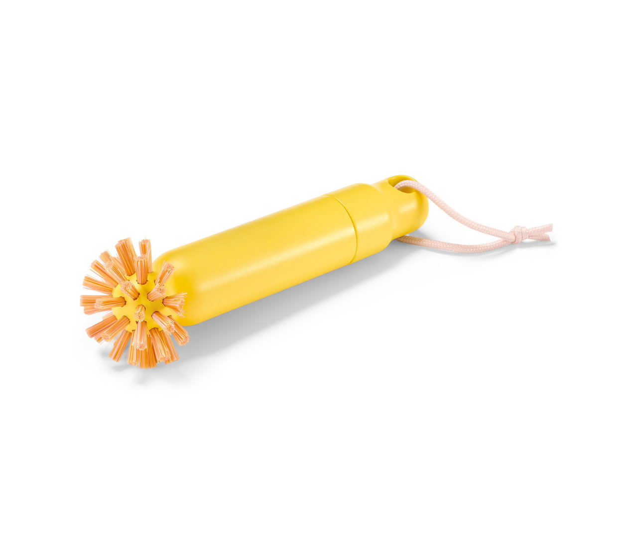 Sárga 2 az 1-ben lefolyótisztító kefe narancssárga sörtékkel és rózsaszín akasztózsinórral.