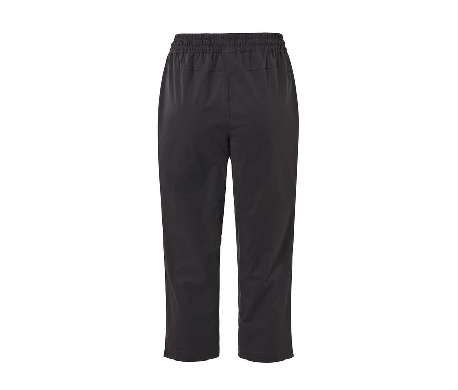 Hátulnézet egy antracit színű női 3/4-es softshell nadrágról.