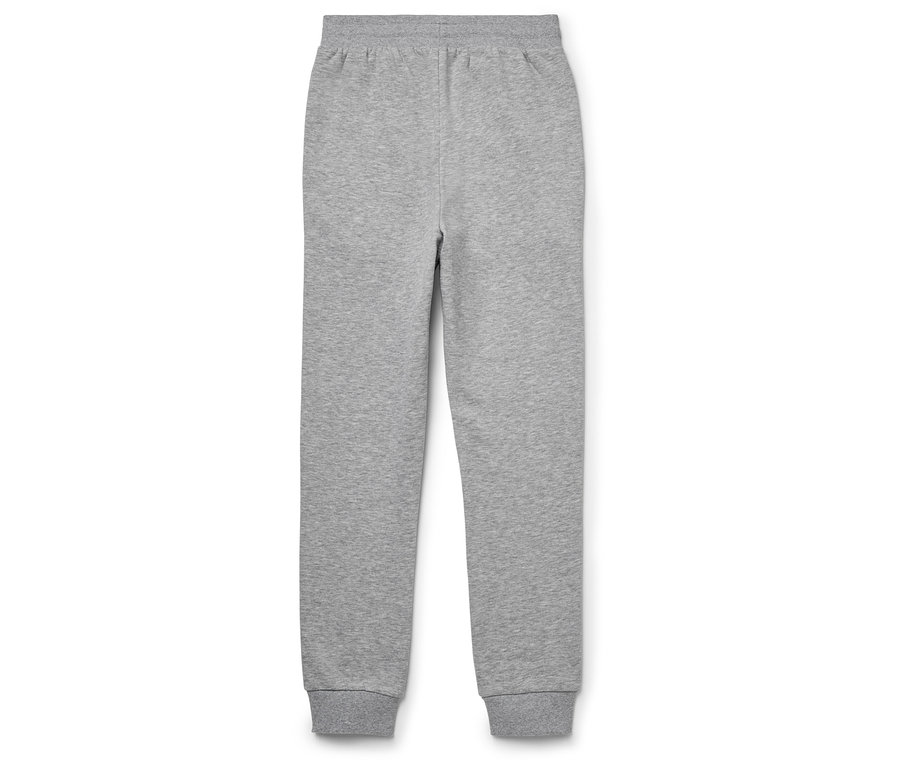 Szürke színű szabadidő nadrág fekszik fehér háttéren.