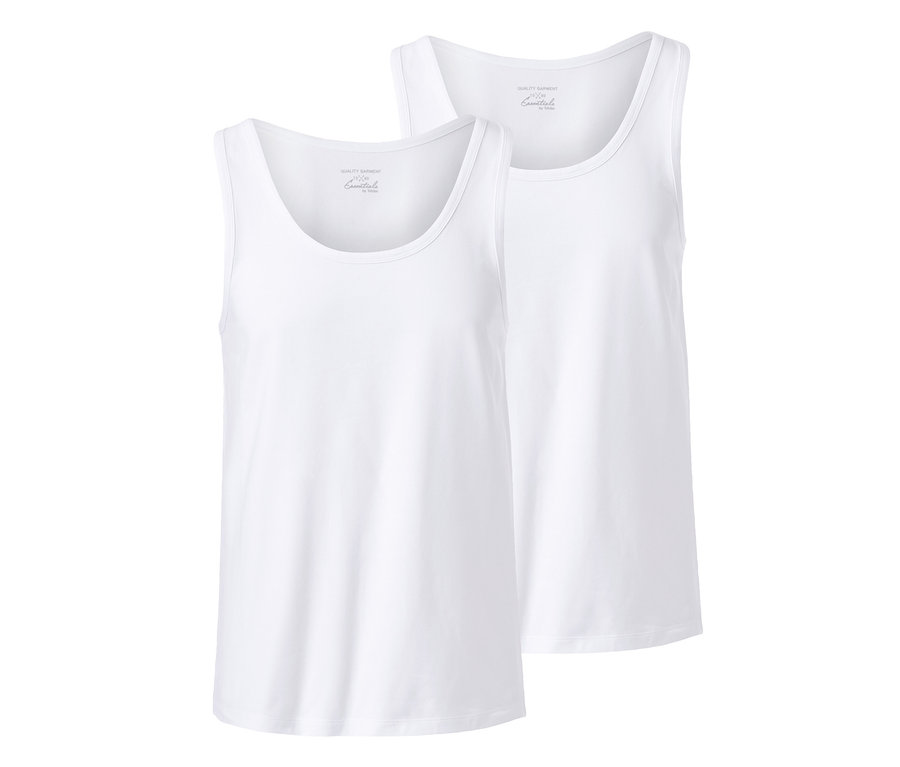 Két fehér dzsörzé trikó.