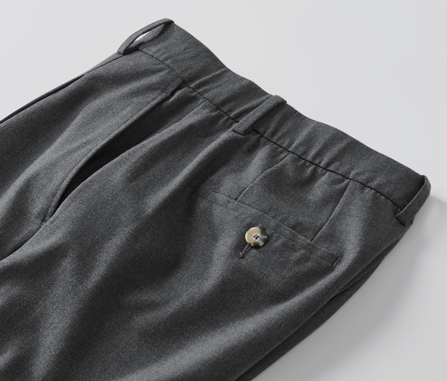 Egy szürke női szövött nadrág, melírozott, szürke részlete.