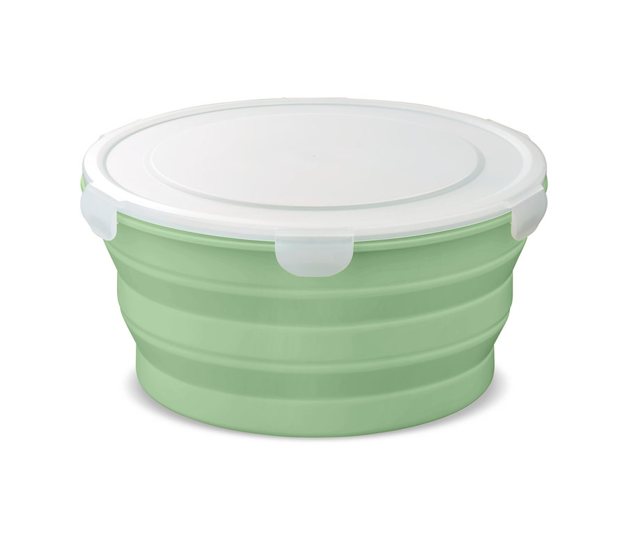 Egy zöld, összehajtható salátástál fehér fedővel.