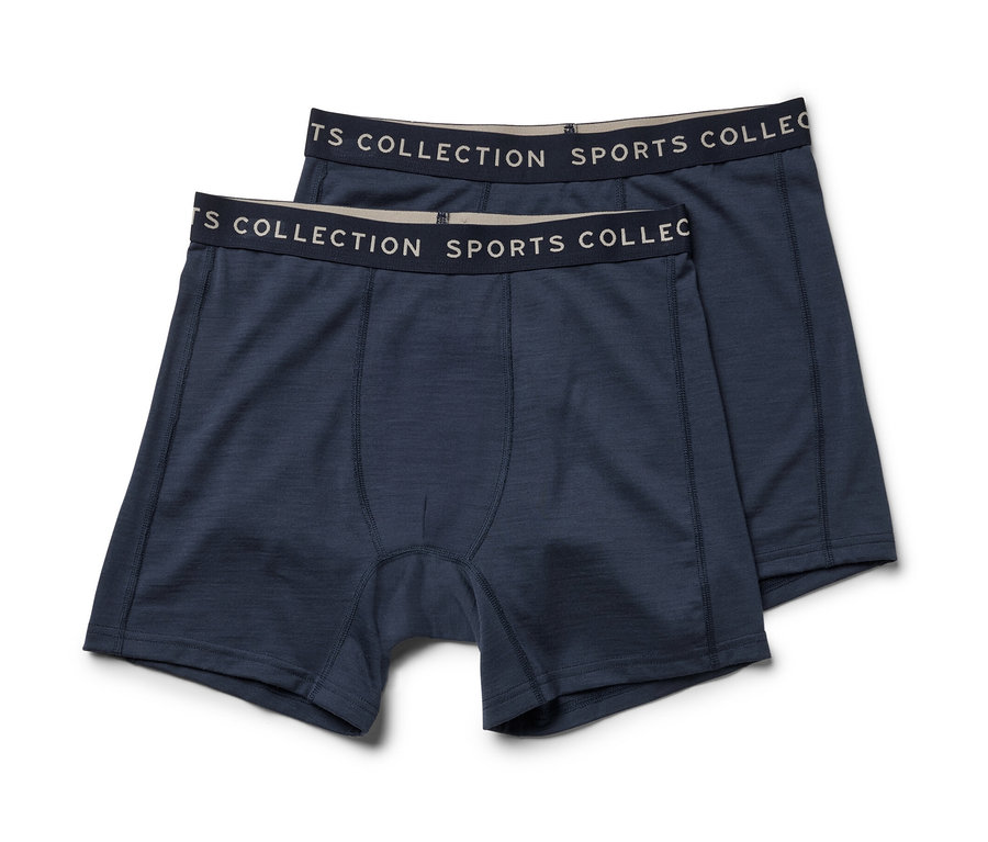 Két kék színű férfi boxer merinó gyapjúval egymáson.