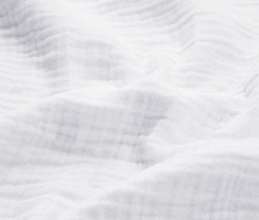 Texturált fehér anyag részlete.