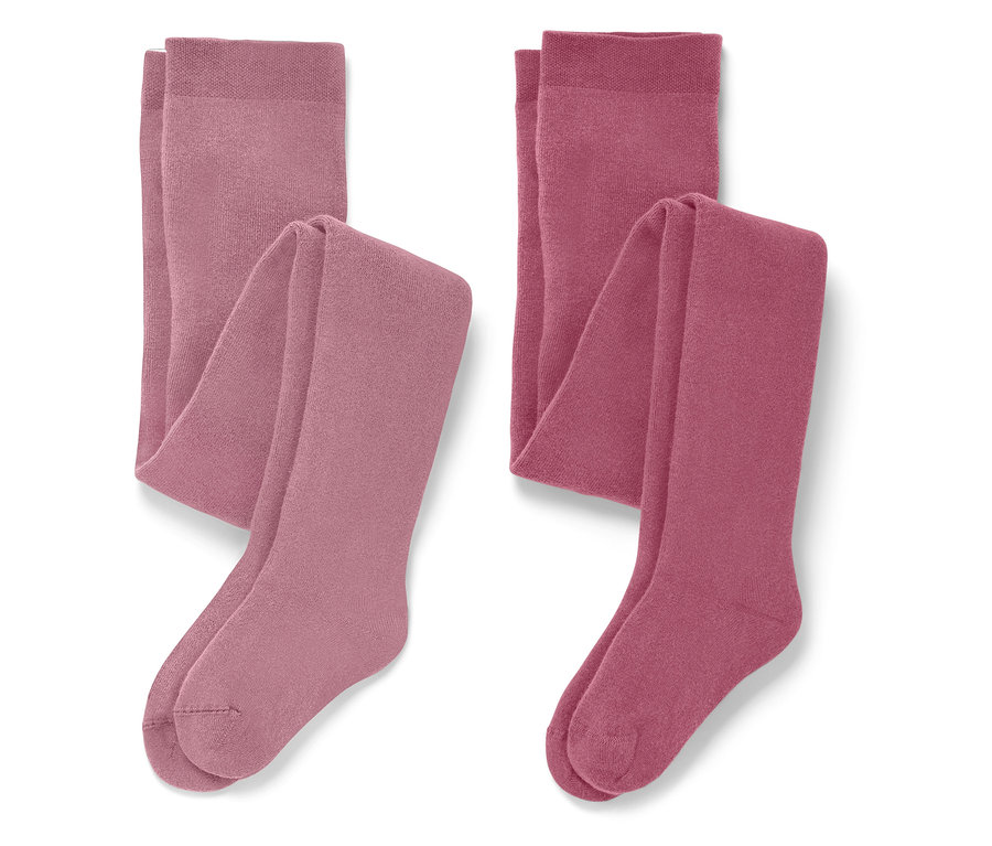Két összehajtott harisnya rózsaszín árnyalatokban.