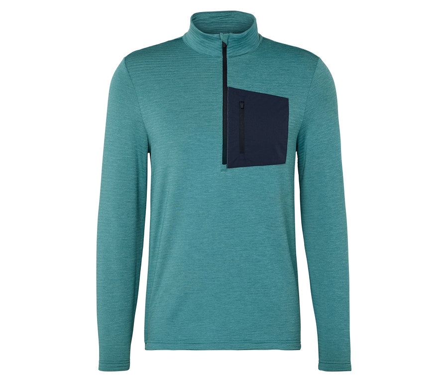 Türkizkék, hosszú ujjú felső rövid cipzárral és sötétkék zsebbel a bal oldali mellkason.