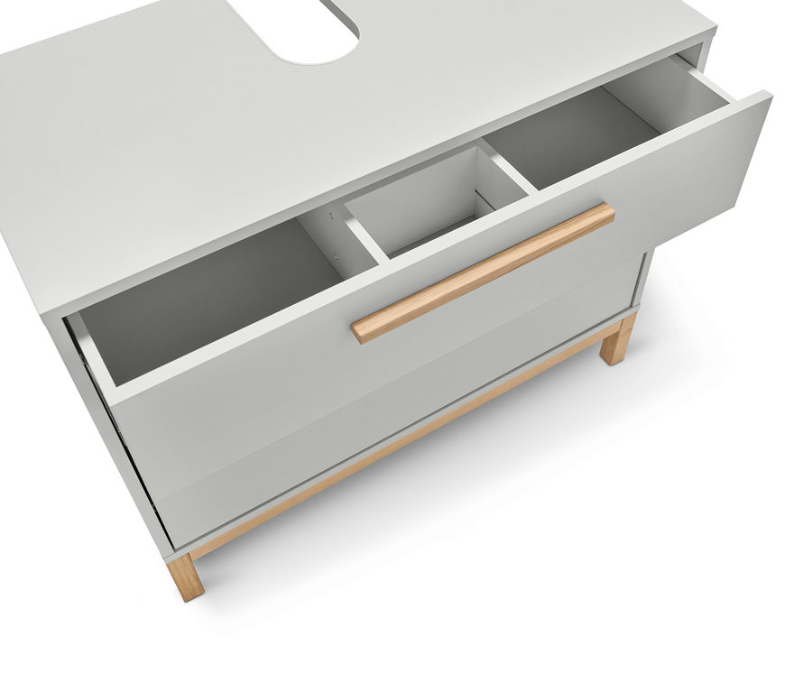 Egy világosszürke mosdó alatti »Eklund« szekrény részletes nézete két fiókkal, melyek közül az egyik nyitva van.