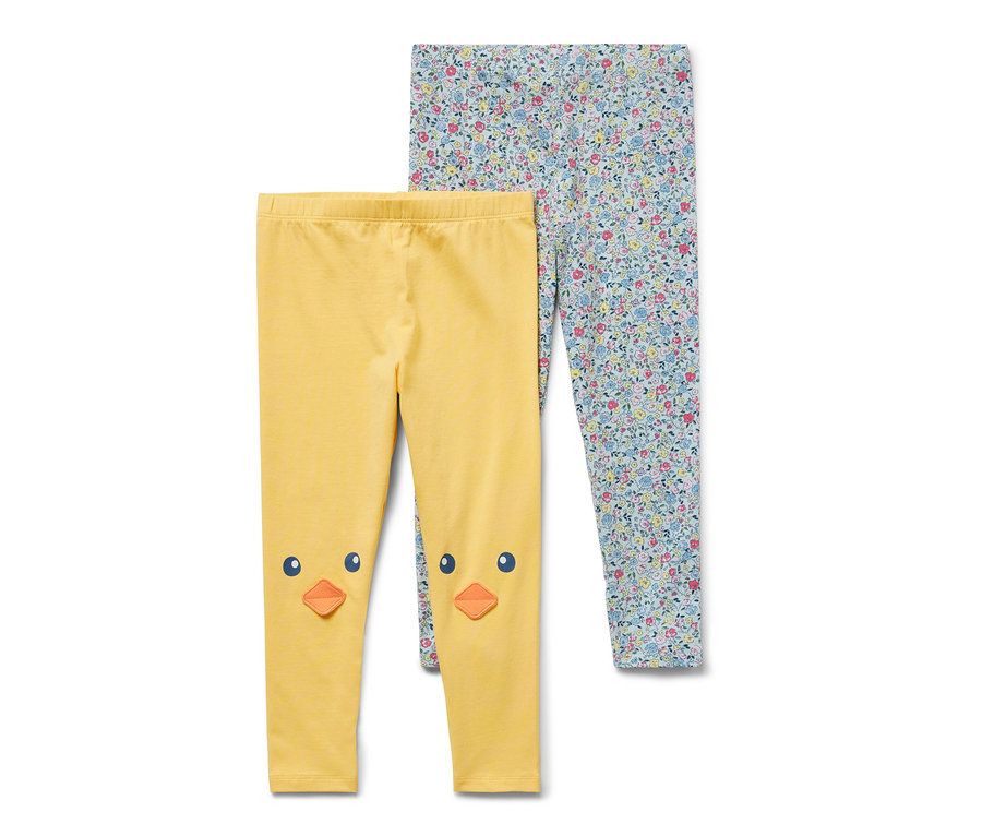 Két kislány leggings: egy sárga csibe mintával a térdén, egy virágmintás.