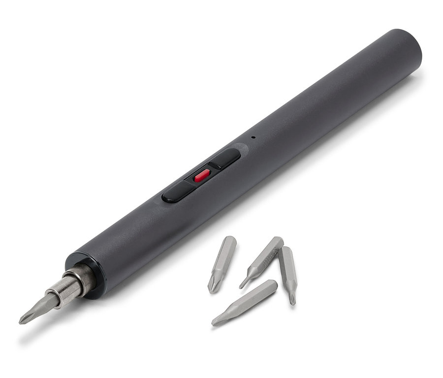 Szürke mini akkus csavarhúzó fejekkel fehér háttéren.