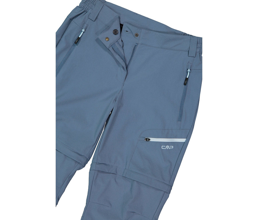 Közelkép egy kékes-szürke CMP nadrágról, látható zseb cipzárakkal és levehető szárral.