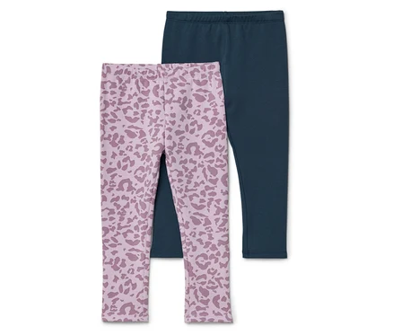 Két leggings, egy sötétkék és egy világos rózsaszín leopárdmintás, egymáson fekszik.