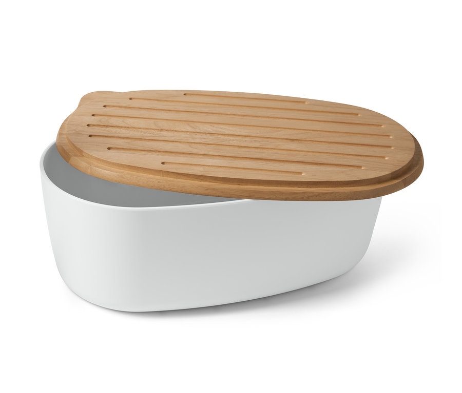 Fehér kenyértartó vágódeszkával.