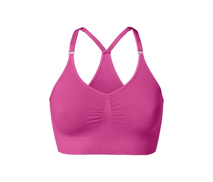 Egy rózsaszín, női bustier sportmelltartó részletgazdag képe.