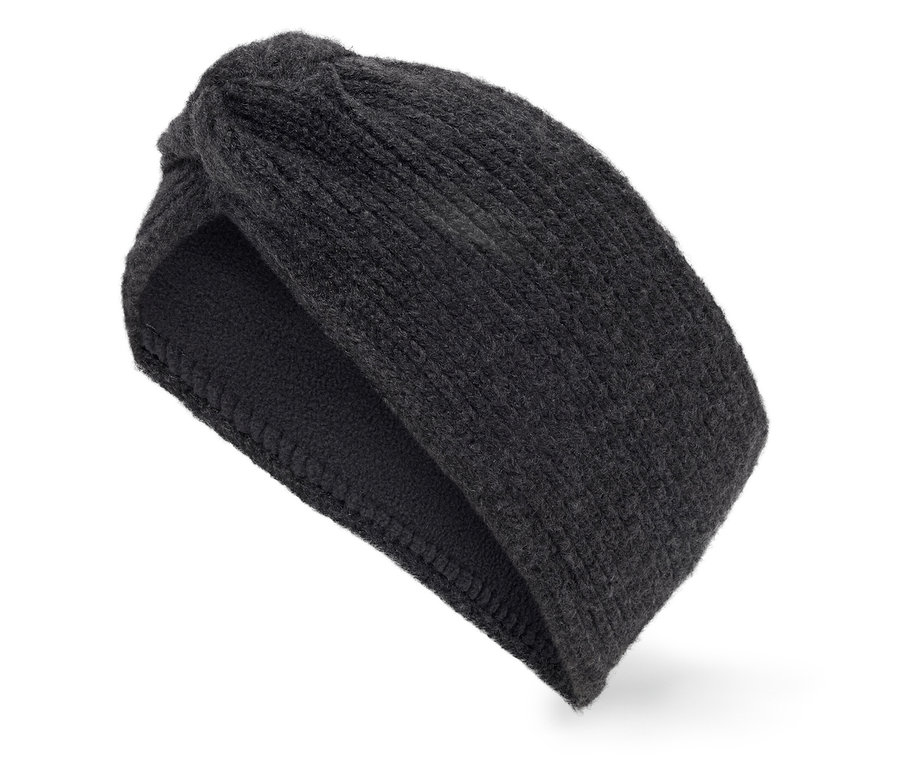 Fekete kötött fejpánt csomóval, fehér háttérrel.