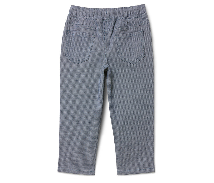 Kék nadrág gumis derékpánttal és két hátsó zsebbel.