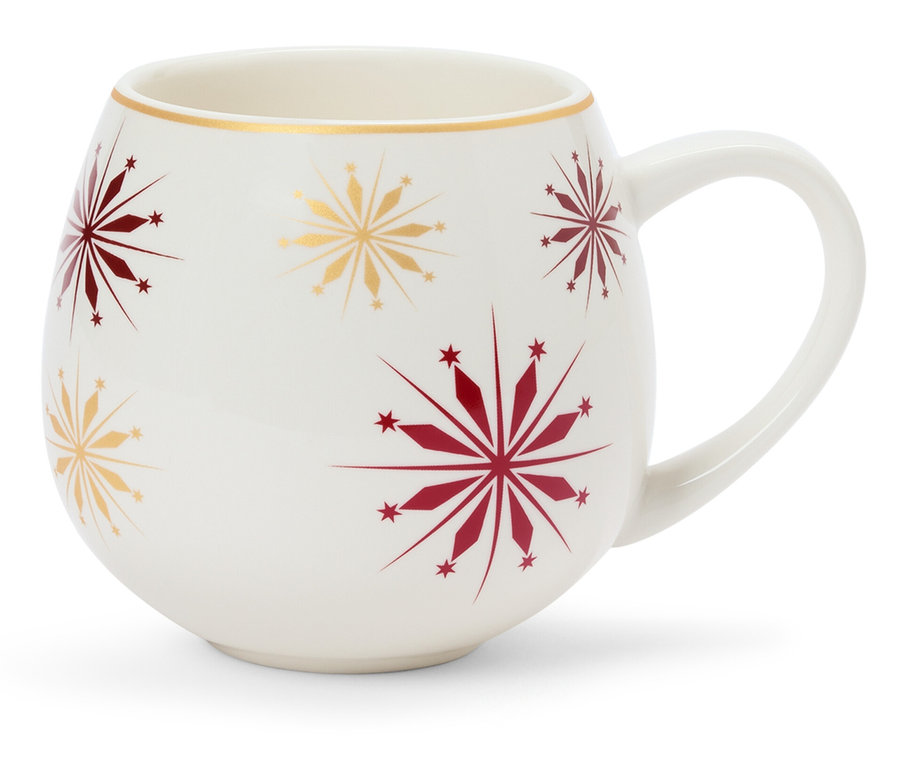 Fehér bögre piros és arany hópelyhekkel.
